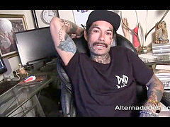 tatted Latino skater hammers off