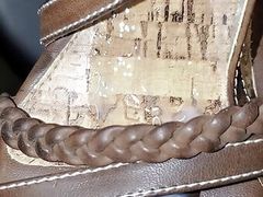 mechanic  found cute brown heels in customer car
