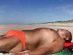 Sunbathing in Fire Island Leopard Orange bikini