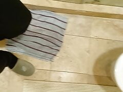 Piss at the airport toilet and shaking cock after peeing