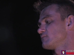 Hunky Gay Strokes His Cock While Buddies Fist Fuck Him