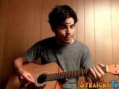 Handsome young man enjoys his guitar and jerkoff solo