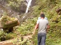 Young lovers being romantic outdoors in nature