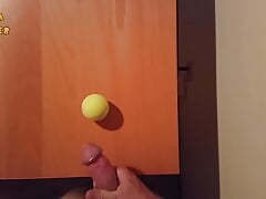 Handjob and cumshot on tennis ball