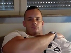 Lusty Bald Muscle Hunk Stroking His Big Cock