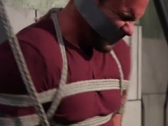 Muscular stud blindfolded for toy play