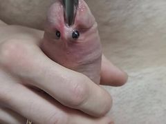 Cock Sounding slow motion moment deep sound penis piercing