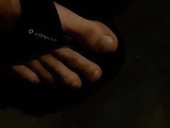 OUCHEE SHOWING OFF HIS TOES IN LOW LIT PUBLIC SIDEWALK