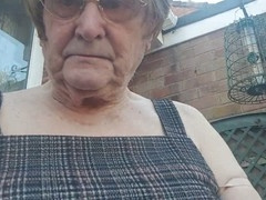 Betty Spanxxx shows off in a short dress during her outdoor solo adventure
