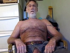 Mature daddy indulging in gay solo roleplay and intense masturbation session