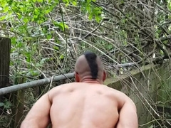 Guy in cutoffs and footwear undresses off and blows a load outdoors