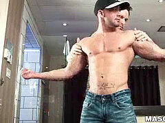 Stud strokes his prick while another guy is fumbling him