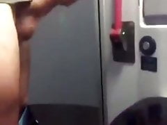 Young boy jerks off in a train