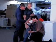 Boy by SEARS workers in the store's basement 4