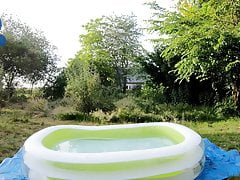 Baggy Pup cooling down in pool (with sneakers and cumshot)