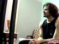 Handsome dude with curly dark-hued hair jerking off his large man rod