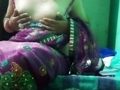 Indian Gay Crossdresser in pink saree pressing and milking his boobs so hard and enjoying the hardcore sex