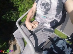 Horny dude strokes his massive cock solo in the great outdoors