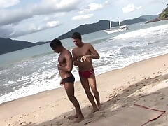 Wild beach fuck together with hot gay boys