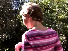 Busty blonde MILF gets naked outdoors