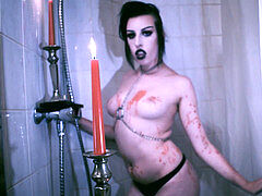 Vampire goth Plays with Candles