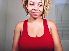Ebony flashing big tits on cam