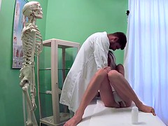 Doctor in gloves fingers sexy blonde patient