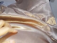 Cum wearing long satin skirt and blouse