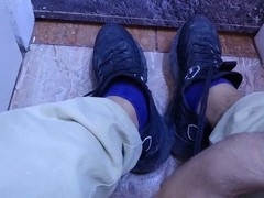 Showing off my dirty sneakers and rubbing my sweaty feet