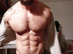 Bearded and muscled guy worships his pecks
