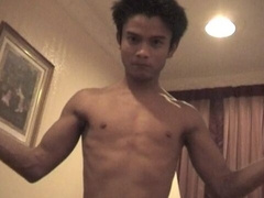Ricky Iglesias flexing to show off his insane body