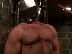 Putting a helmet on his head and using his body and cock