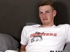 Twink strips during an interview and strokes his big schlong