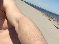 Brainwashed gooner man jerks his weenie on public beach