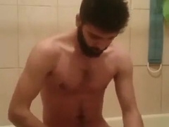 IRAQI ARAB FELLOW MUSLIM FAPS HIS CHISEL IN THE DOUCHE