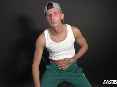 Lubricating and tugging off immense cock boy