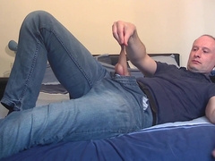 Kudoslong pulls down his denim and lingerie and wanks his unshaved cock until he is swell
