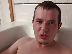 Mild watersport in the bath pt 2 - guy talks to the camera before peeing on himself in the bath tub