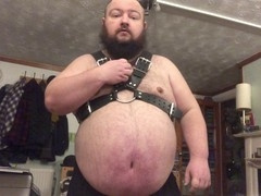 Chubby bear Hoggtubbs in a harness with a big belly and a gay funnel