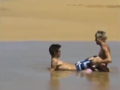 Boyfriends enjoy sex on the beach