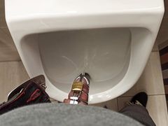 Pissing in public toilette