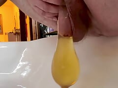 Warm Morning Yellow Piss Into a Condom