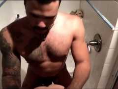 Big-cock Latin amateurs bareback anal in the shower after the gym.