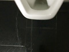 Pissing over the toilet at work