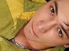 Slut stares at the camera in gay porn vid