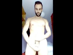 Hot guy Zeus Ray with a massive cock jacking off until he blows a huge load