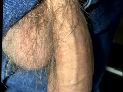 Sinewy Man Rod Drapes Out Of Denim Close-Up