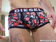 Hot tattooed stud jerks off his throbbing cock on camera