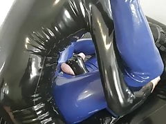 Being fucked in rubber by a gimp