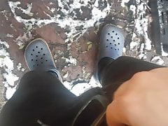Young boy pissing in the snow